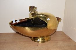 A 19th century brass coal helmet with shovel, L56cm