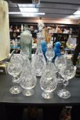 A group of crystal cut glass ware comprising of six wine glasses, six port glasses and a decanter