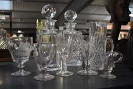 A pair of cut crystal decanters with the initials J.M.M, h26cm, sold together with a selection of