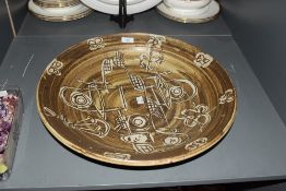 A large stoneware bowl decorated depicting the Lancaster Bomber, impressed marks to base, W48cm