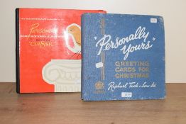 Two scrap books by Raphael Tuck & Sons and Sharps Classic, inside showcasing a wonderful