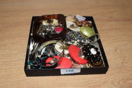 A collection of costume jewellery, including clip-on earrings, rings and bangles