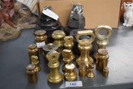 A set of 'Ivory Imperial' cast iron weights, sold together with various other brass weights.