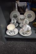 A Georgian style fine bone China part tea service decorated having hand-painted foliage and black