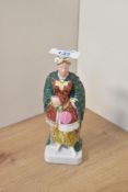 A figural porcelain flask in the form of an Ottaman Sultan, signed to base, h15cm