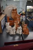 A selection of Beswick Pottery cat and kitten studies including seated Persian number 1867, kitten