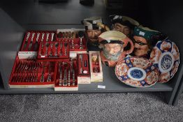 Four Royal Doulton character jugs, to include Dick Turpin, sold together with a pair of Chinese