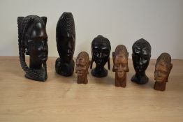 A group of hand carved African hardwood sculptural busts, ( 7 ).