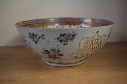 A large 19th century Chinese Famile Rose punch bowl, the interior hand decorated having a