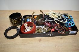 An assortment of costume jewellery, including statement necklaces, faux pearls, beaded examples