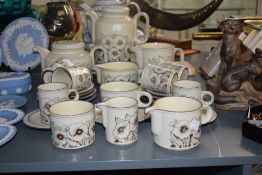 A Hornsea Cornrose pattern pottery tea service, decorated with foliage on a cream glaze ground, to