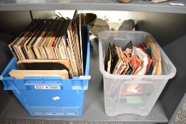 Two boxes containing various 12' records and 7' records, to include Hudd Dunnit, The Sound of Music,