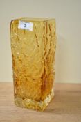 A mid-century Whitefriars style yellow glass vase of square form having bark textured pattern, h22