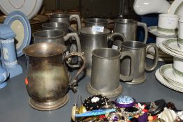A group of pewter tankers in various sizes, ( 9 ).