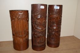 A group of early 20th century Chinese bamboo brush pots, beautifully carved showcasing traditional