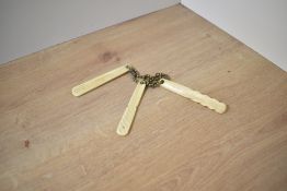 Three early 20th century bone teething sticks, L8cm