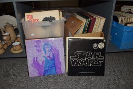 Two boxes containing various 12' records, to include Cigarette Whiskey and Wild Wild Woman by