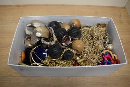 A large collection of costume jewellery, including statement necklaces, neck chains, beaded examples