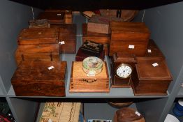 A group of various jewellery boxes and tea caddies, to include a Quartz mantle clock and a tin