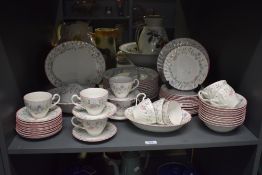 A Johnson Brothers fine bone china tea service, decorated with foliage and pink edging on a white