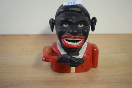 A cast iron Jolly gent money box, having working mechanism, h13cm