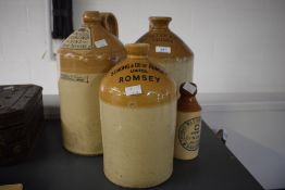 Three stoneware flagons; Geo Ayre & Son of Thirsk,h33cm, a Strong & Row of Romsey,h27cm, John