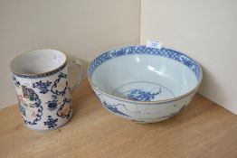 A Chinese blue and white porcelain fruit bowl, the exterior decorated with traditional landscape