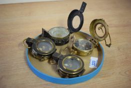 A T.G.Co Ltd London military compass, date code for 1941, sold together with three other
