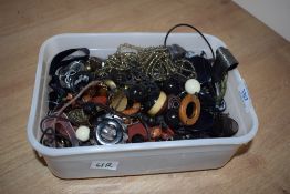 A collection of beaded necklaces, including ribbon decorated examples and statement pieces