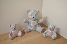 Three Park Rose pottery Bridlington bears, hand coloured with blue and pink foliage, largest h17cm.