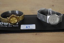 A Skagen wristwatch, the silver dial with baton numerals on a stainless steel bracelet strap,