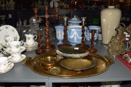 A group of brass wares, to include two Chinese bowls, a large oval serving tray with hammered