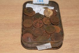 An early 20th century Player's Whiskey Brown Flake tin tobacco box containing 34 Three pence pieces,