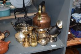 An electric copper kettle having shaped spout and handle, h28cm, sold together with a pair of