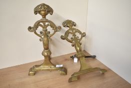A large pair of brass fire dogs / andiron's moulded in the classical style, h37. Condition: slight