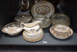 A Washington Indian tree pattern part dinner service, decorated having floral patterns on a white