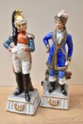 Two Capodimonte style figures depicting a war general and a sea master, both measure 23cm.