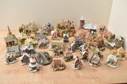 A large assortment of Liliput Lane (17) studies including 'St Stephen's Church', 'An Apple a Day'