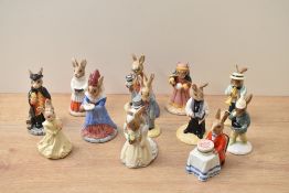 A collection of twelve Royal Doulton bone china Bunnykins series figures including characters '