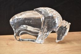 A Swarovski crystal 'Symbols Collection' Buffalo, measuring 10cm x 16cm, complete with box.