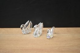 Three Swarvoski Crystal Swan studies, complete with boxes.