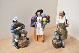 A group of three Royal Doulton bone china figures and figurines comprising 'The Lobster Man' HN