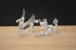Two Swarovski Crystal SCS Collection studies Pegasus and Dragon, both boxed.