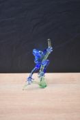 A Swarovski coloured Crystal frog on branch, boxed and with certificate of authenticity, measures