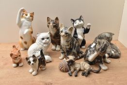 A Goebel porcelain sitting white Persian cat model number 31 032 15 sold alongside a selection of