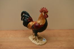 A Beswick Pottery Leghorn Cockerel model number 1892 designed by Arthur Gredington in teal,green,