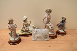 Four Lladro porcelain figurines comprising 'Florinda' number 4907, 'Spring Girl' number 5217, 'Sweet