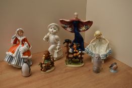 A Royal Doulton bone china figurine 'Noelle' HN 2179 damage to base, Royal Worcester bone china