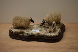A Border Fine Arts animal group 'Early Lambs, Late Snow' model number 113 by Ray Ayres on wooden