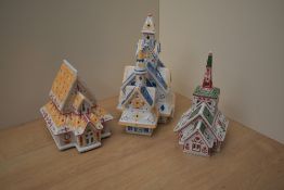 Three Villeroy & Boch porcelain festive candle houses.